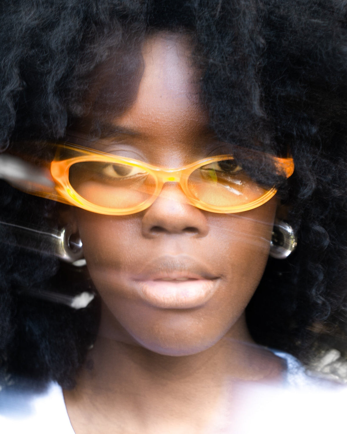 Lockwood Avenue Flatlist Olympia sunglasses with orange Italian acetate frames and matching orange Carl Zeiss lenses.