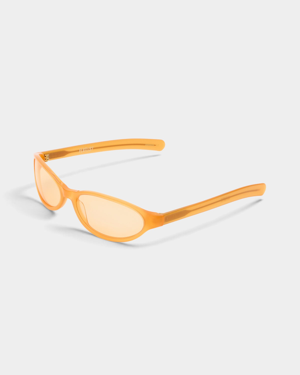 Lockwood Avenue Flatlist Olympia sunglasses in translucent orange Italian acetate with matching orange Zeiss lenses.