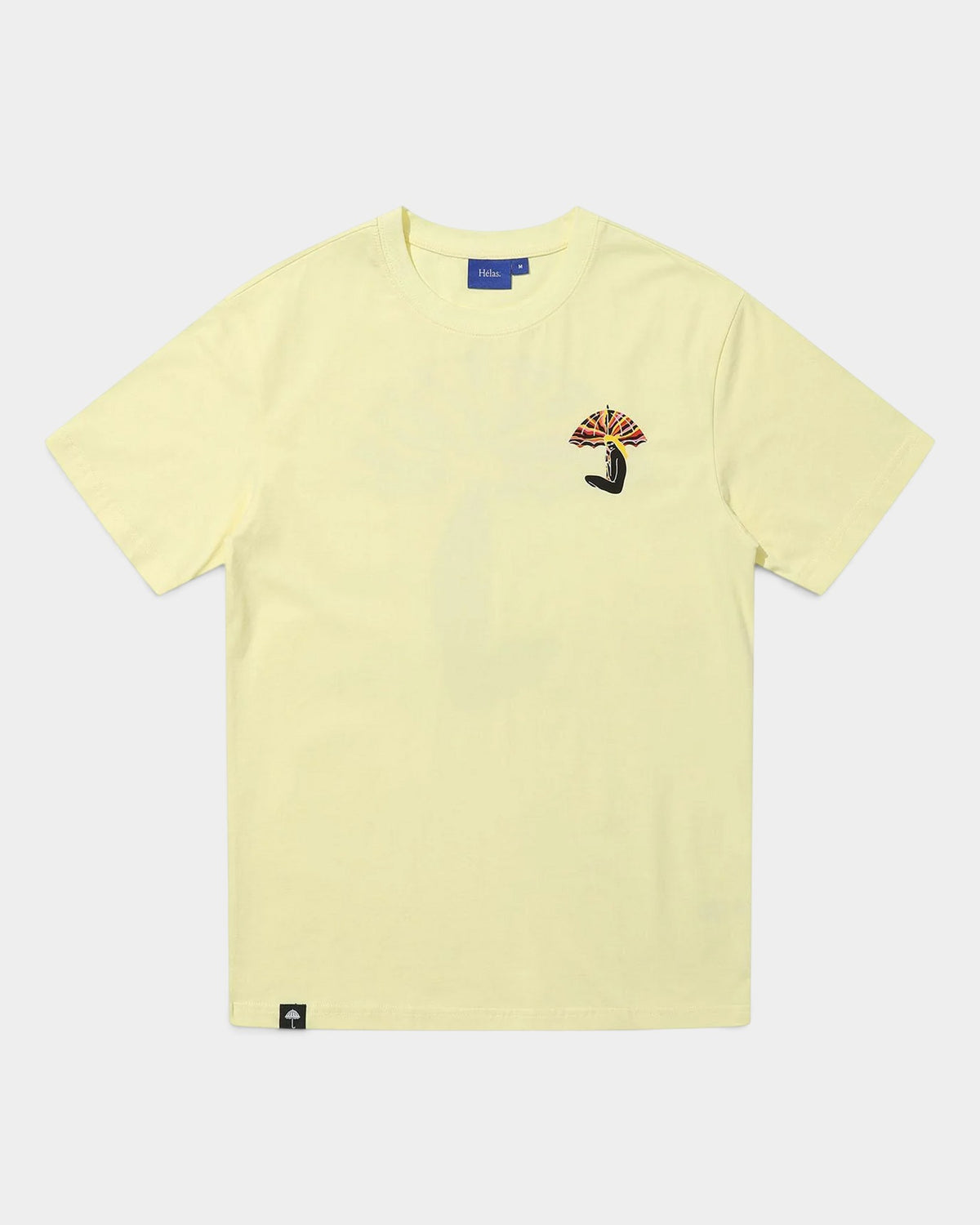Lockwood Avenue Hélas pastel yellow cotton t-shirt with small sunset umbrella graphic on the chest