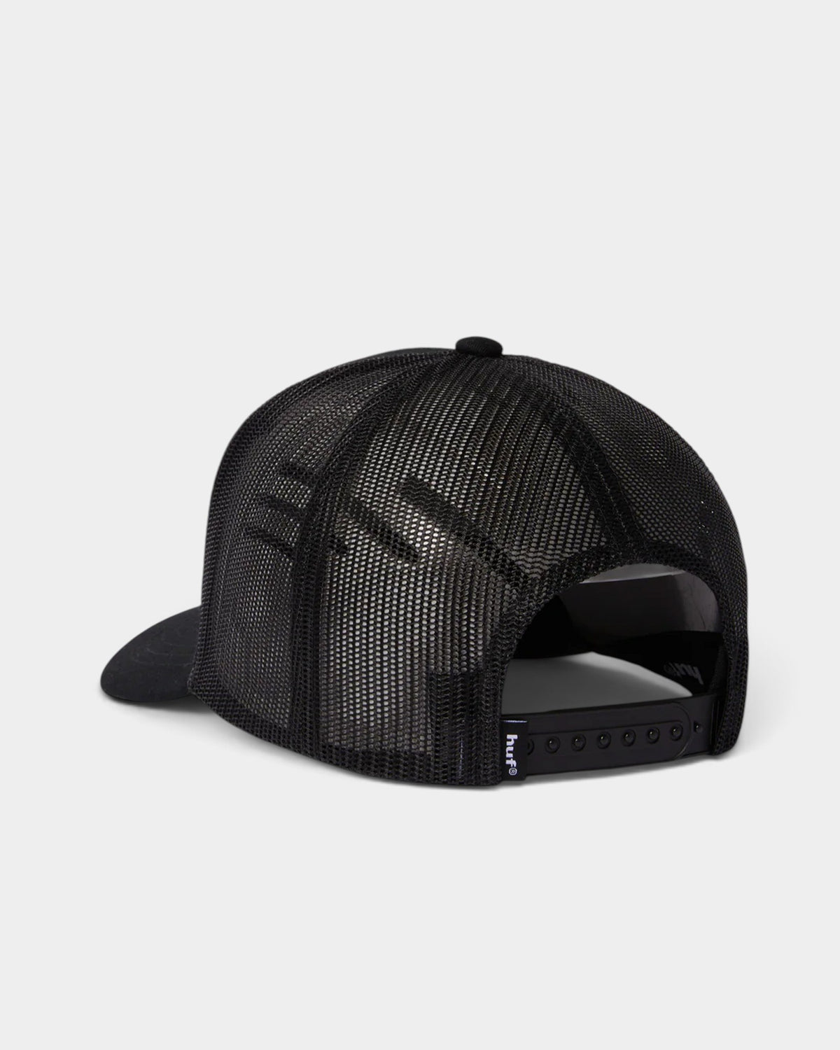 Lockwood Avenue HUF black trucker cap with breathable mesh back and adjustable snap closure seen from the rear.