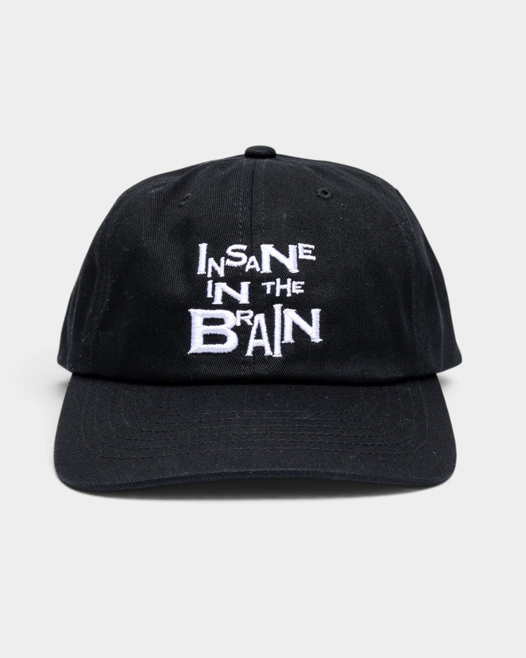 Lockwood Avenue black cotton twill six-panel snapback cap featuring white Insane in the Brain embroidery