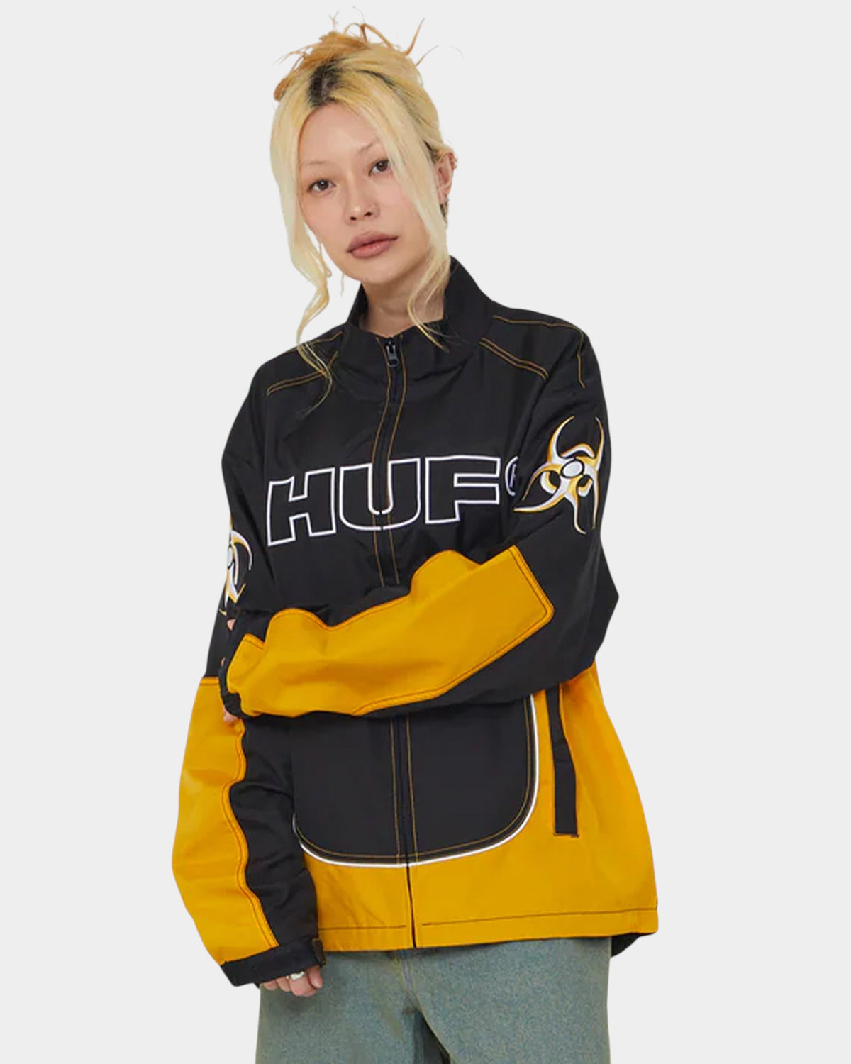 Lockwood Avenue HUF Sector Jacket in black and yellow nylon with racing-inspired graphics and reflective piping.