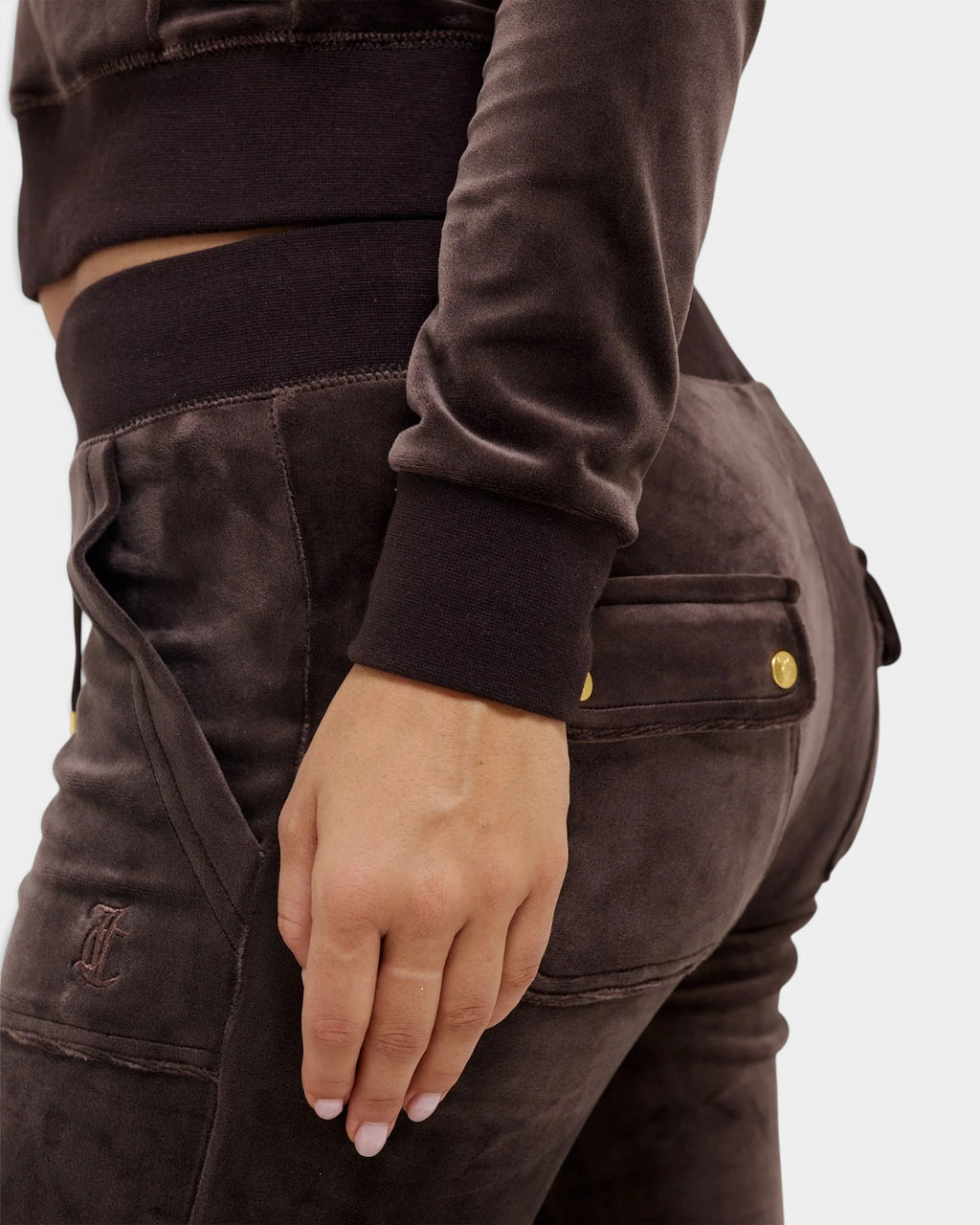 Lockwood Avenue Juicy Couture java brown velour track pants with gold-tone hardware and back patch pockets.