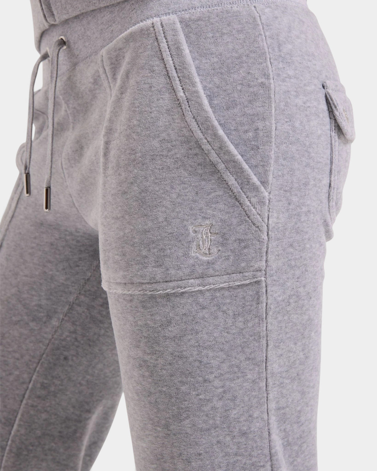 Lockwood Avenue Juicy Couture silver marl velour flare joggers with front patch pockets and embroidered JC logo