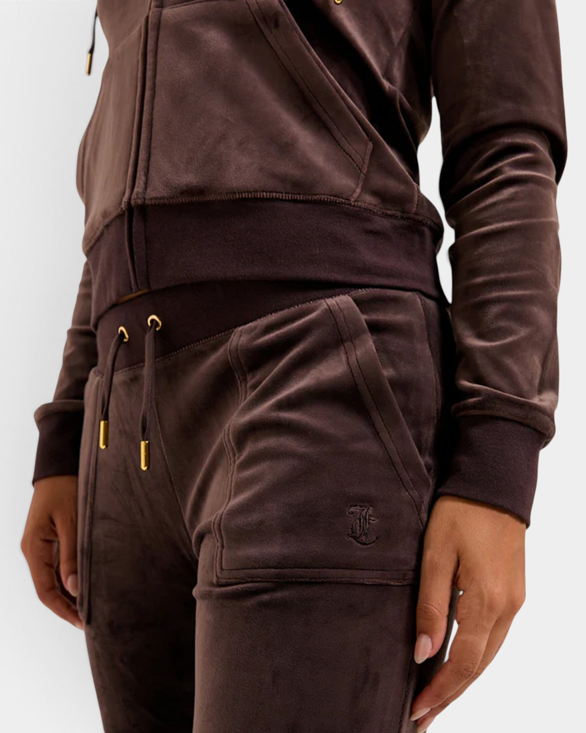 Lockwood Avenue Juicy Couture java brown velour track pants with gold-tone drawstring hardware and patch pockets.