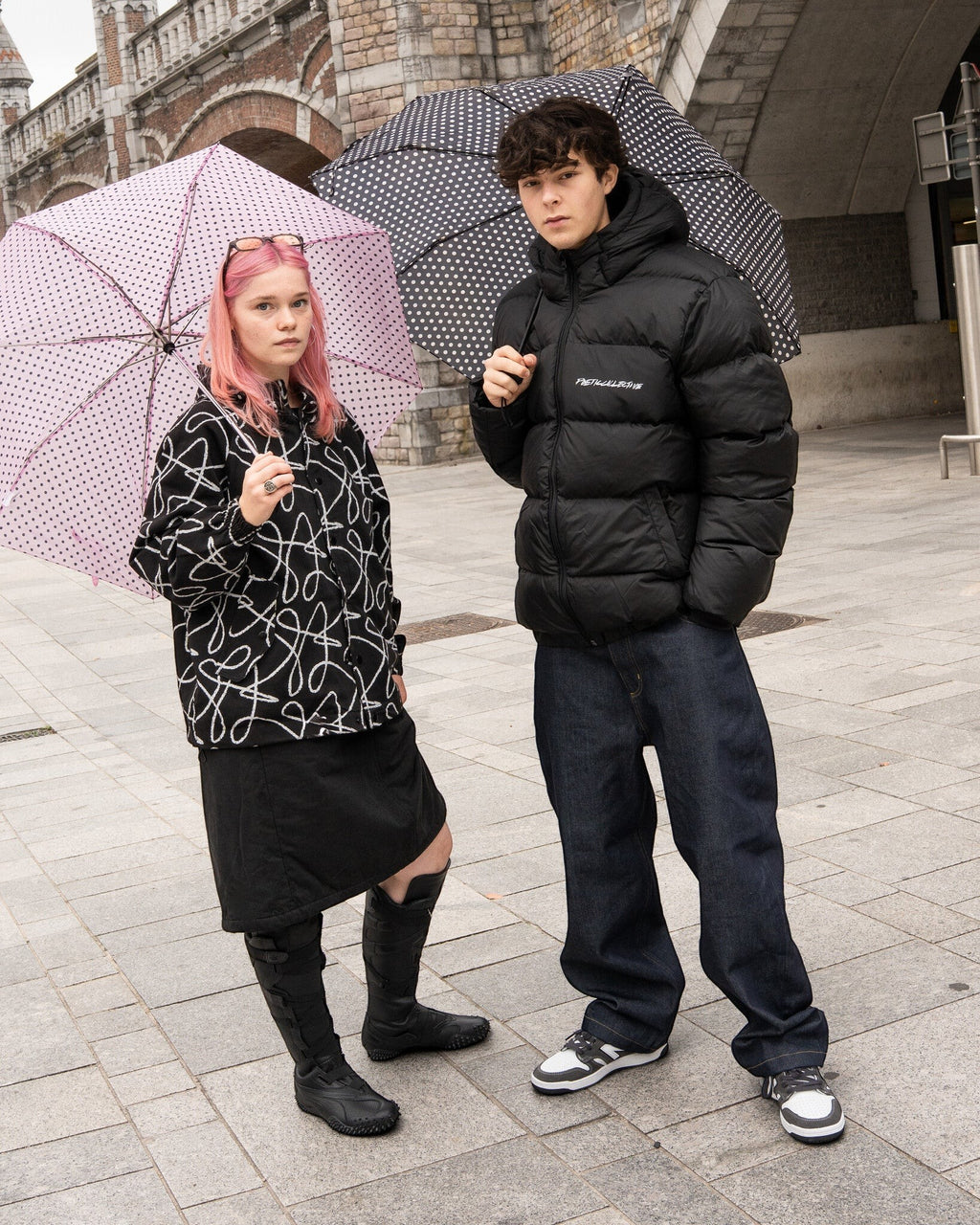 Lockwood Avenue Kappy Padding Skirt in black cotton with hidden insulation, worn by a model with pink hair.