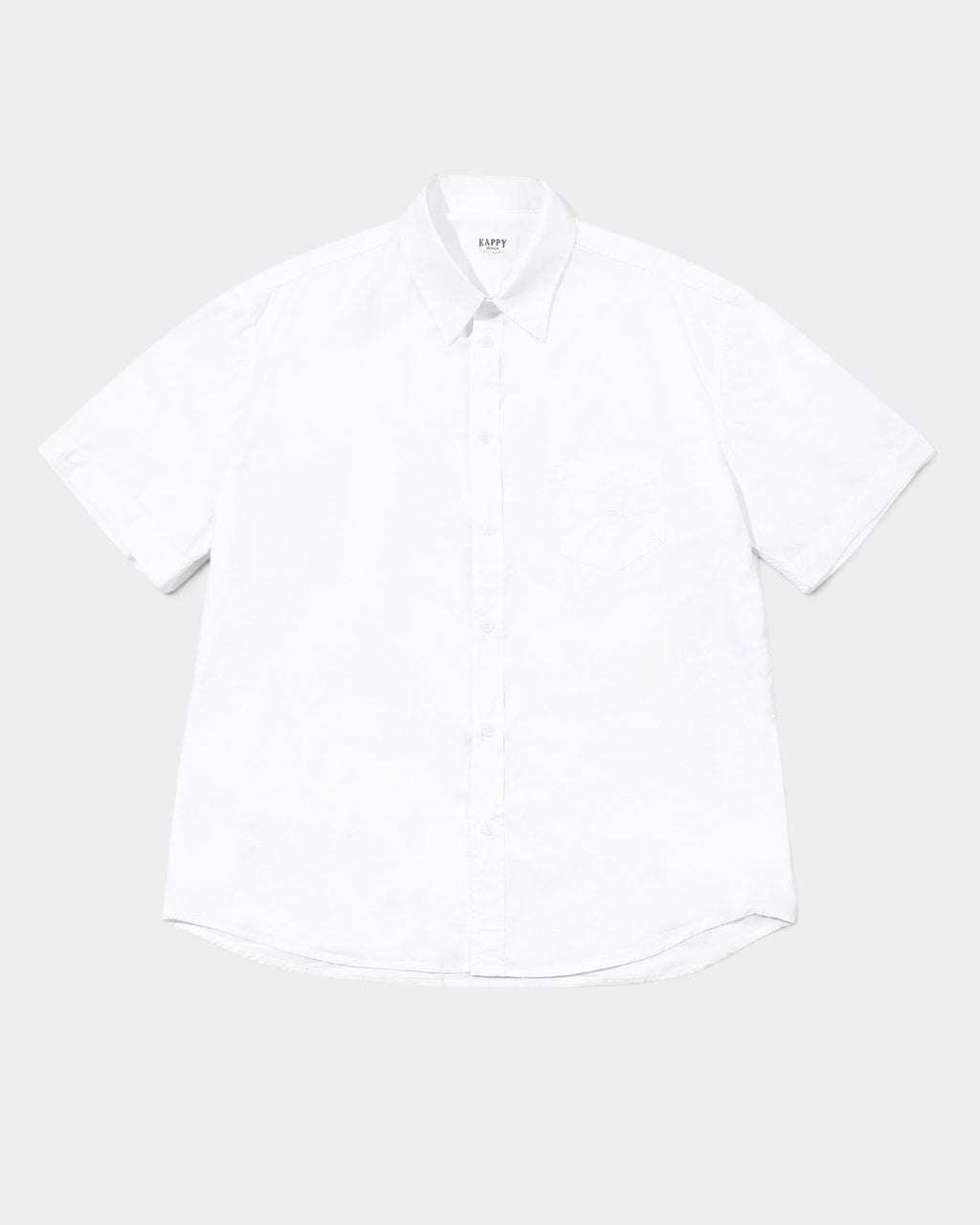 Lockwood Avenue Kappy white cotton poplin short sleeve button-up shirt with a pointed collar and chest pocket.