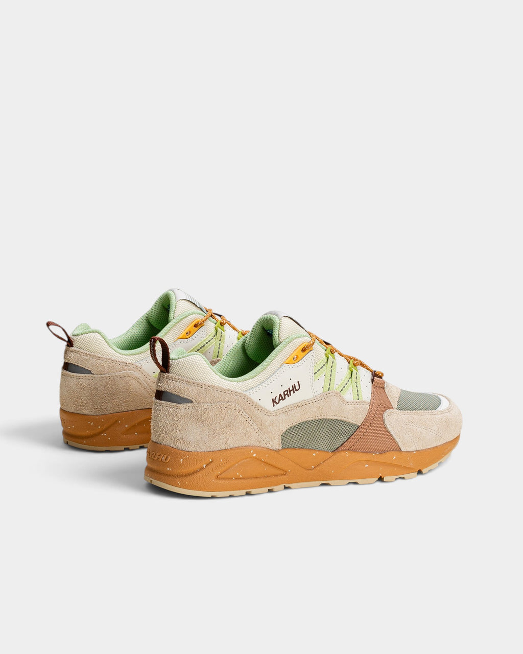 Lockwood Avenue Karhu Fusion 2.0 sneakers in turtledove off-white and shadow lime with suede, leather, and mesh layers.