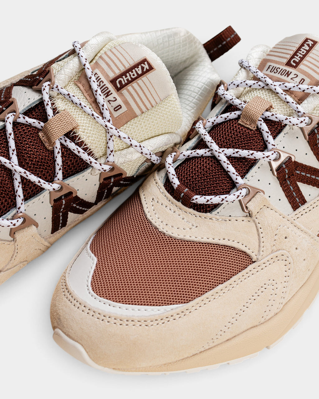 Lockwood Avenue Karhu Fusion 2.0 sneakers in turtledove and cappuccino suede, leather, and mesh with patterned laces.