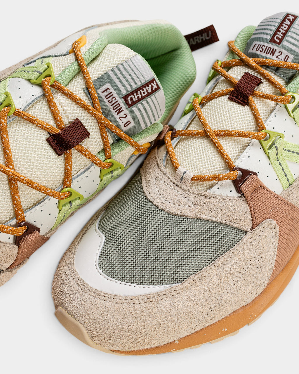 Lockwood Avenue Karhu Fusion 2.0 sneakers in turtledove off-white and shadow lime green suede, leather, and mesh.