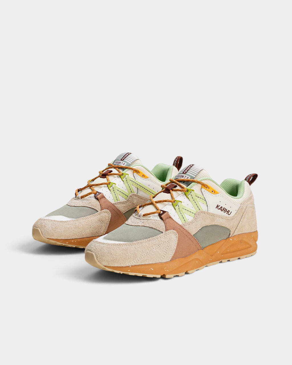 Lockwood Avenue Karhu Fusion 2.0 sneakers in turtledove off-white and shadow lime green suede, leather, and mesh.
