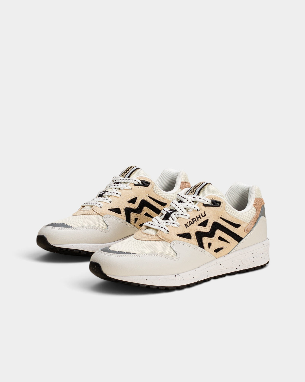 Lockwood Avenue Karhu Legacy 96 sneakers in off-white and wood-tone suede with mesh panels and speckled EVA midsole.
