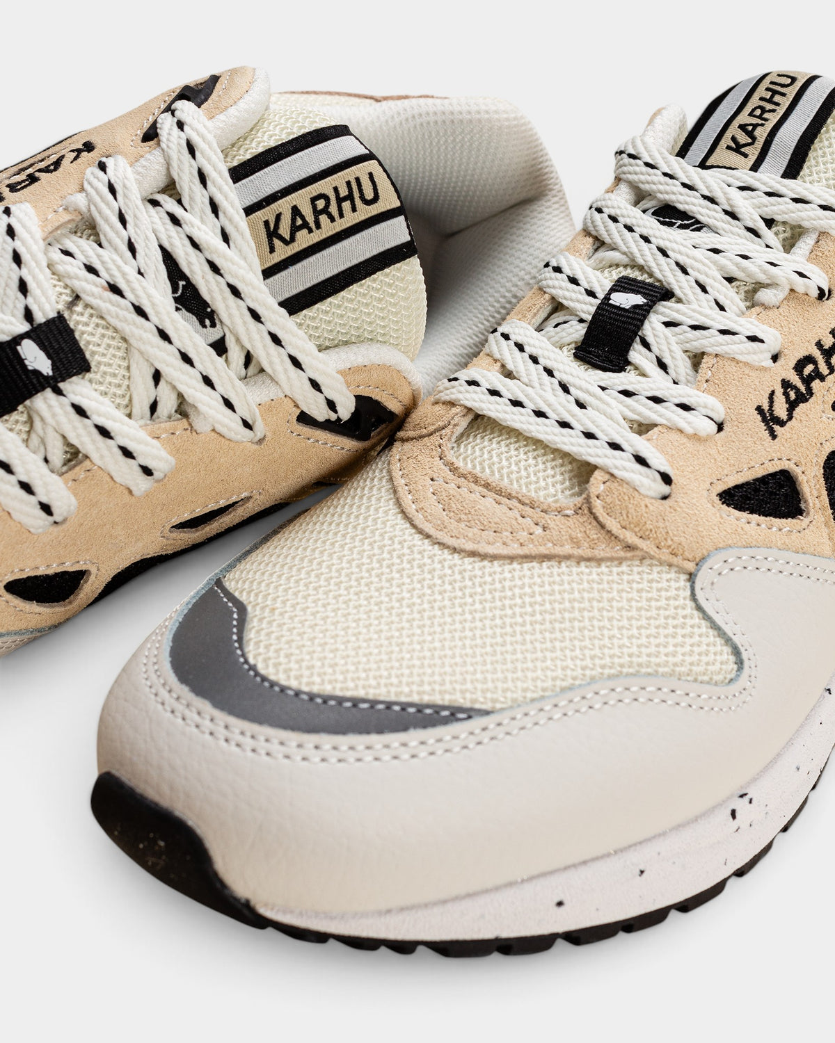 Lockwood Avenue Karhu Legacy 96 sneakers in off-white mesh and wood-toned suede with speckled EVA midsole detail.