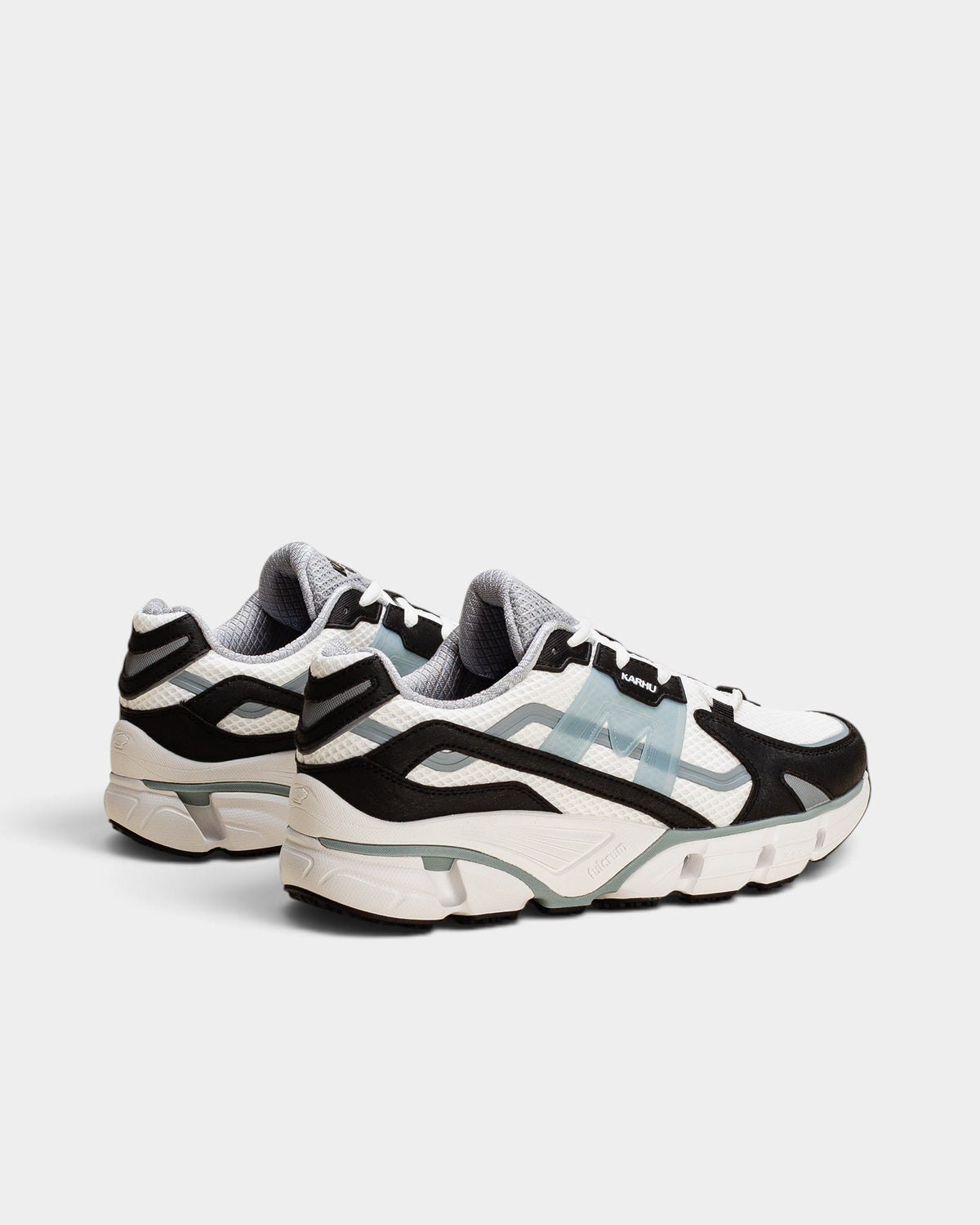 Lockwood Avenue Karhu Super Fulcrum running shoes in black and sterling blue with mesh panels and cushioned soles.
