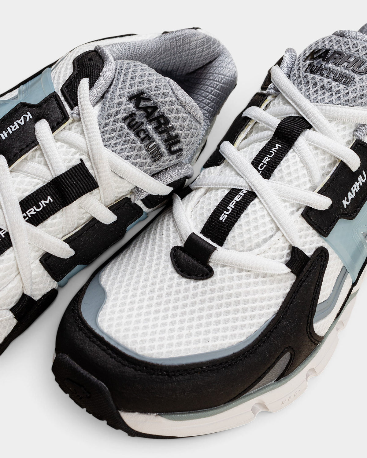 Lockwood Avenue Karhu Super Fulcrum running shoes in black and sterling blue with breathable mesh and synthetic panels