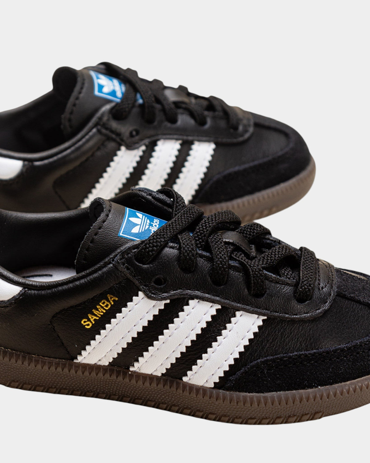 Lockwood Avenue adidas Kids Samba OG shoes in black leather with white stripes and a gum rubber sole.