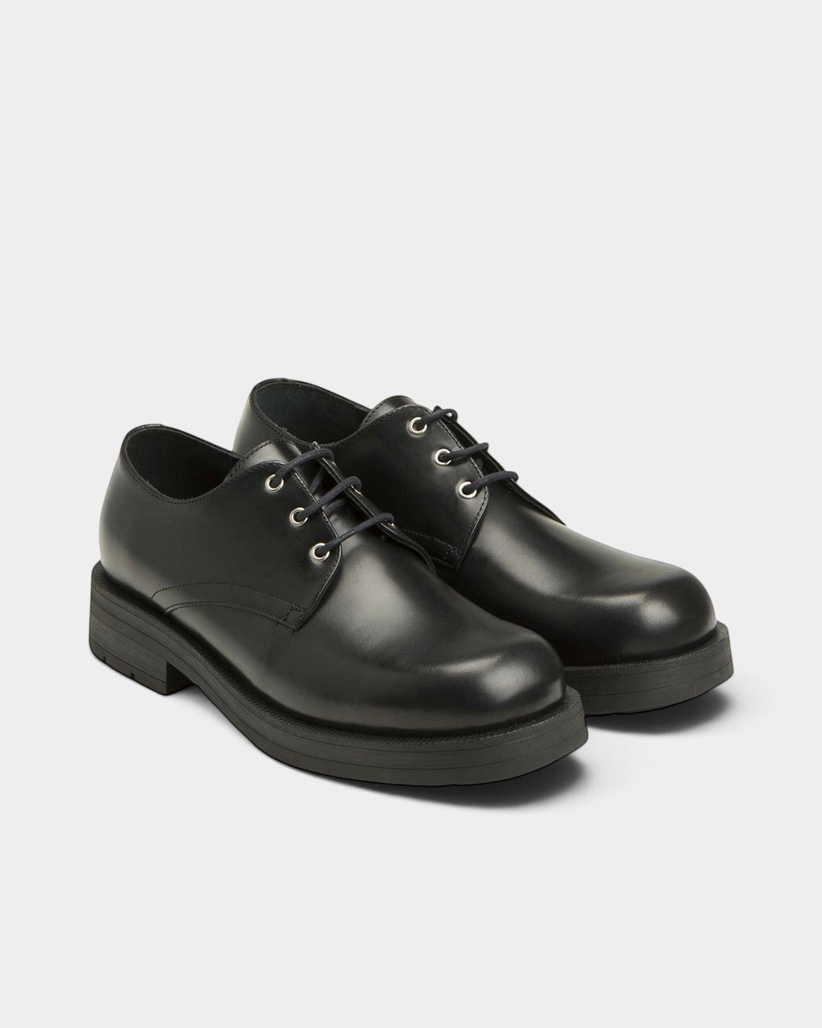 Lockwood Avenue Kleman Chemin black leather derby shoes with a thick sole and vintage-style lace-up design.