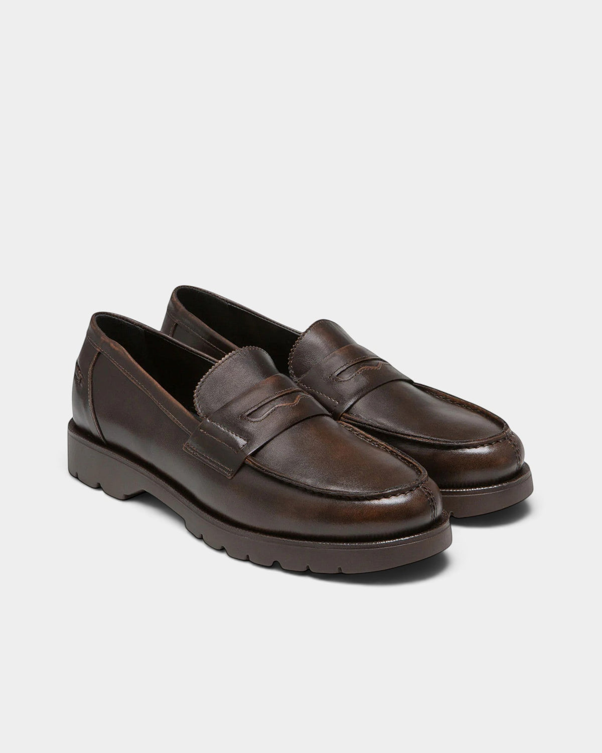 Lockwood Avenue Kleman Cotteur brown full-grain cowhide leather slip-on loafers with a durable rubber lug sole.