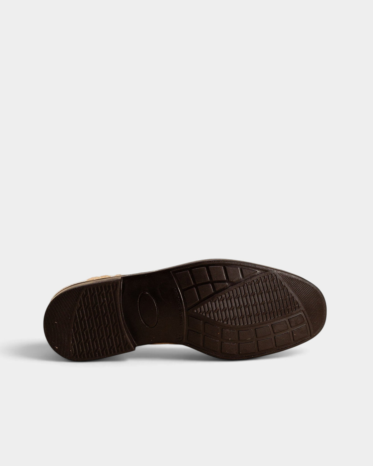 Lockwood Avenue Kleman Dalior 2 penny loafer showing the dark brown textured rubber sole with anti-slip grip pattern