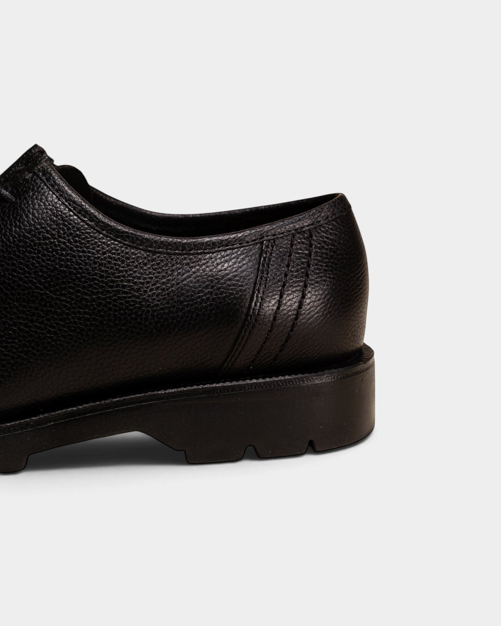 Lockwood Avenue Kleman Padror G VTG black grained vegetable-tanned leather derby shoe heel and lug sole detail
