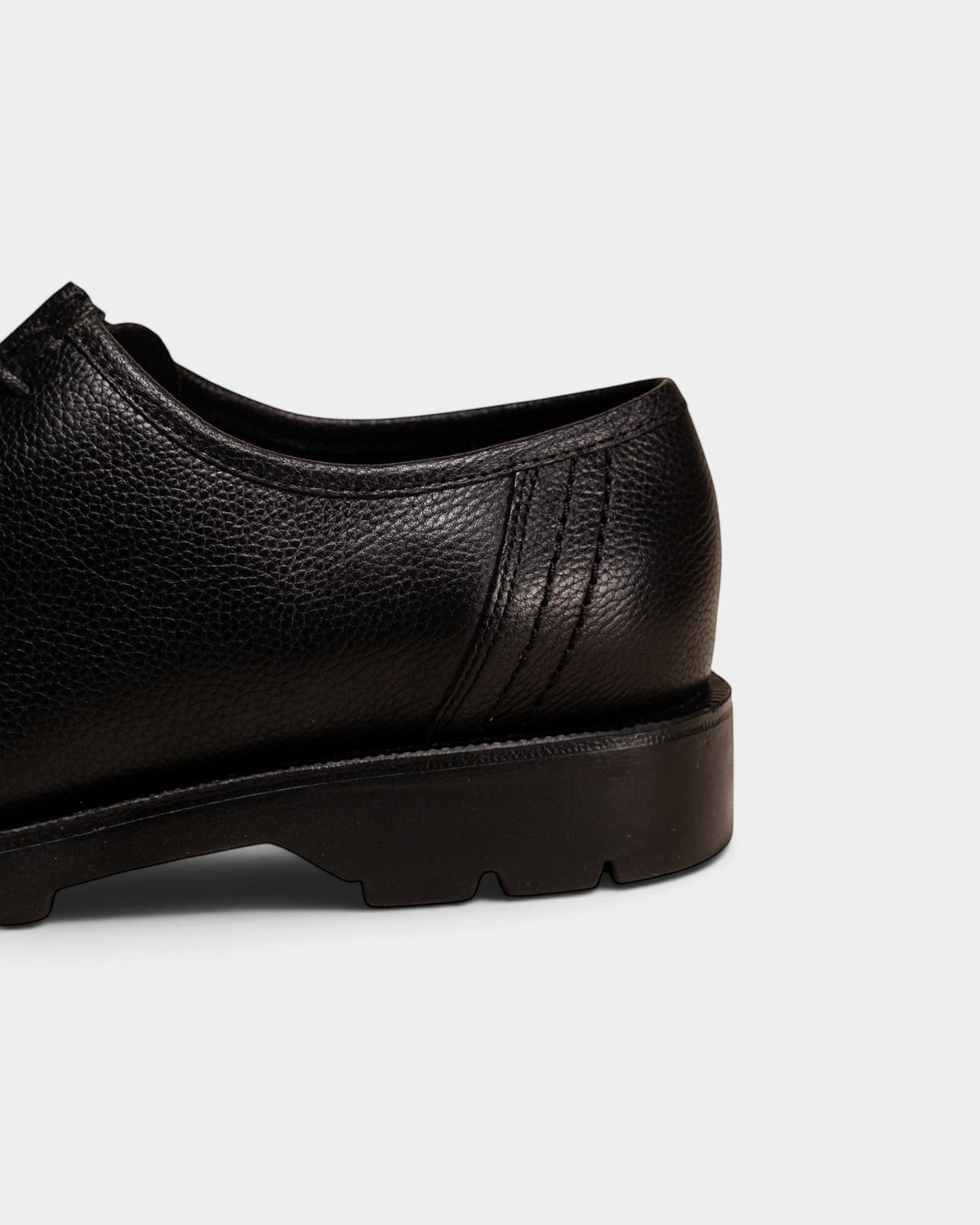 Lockwood Avenue Kleman Padror G VTG black grained vegetable-tanned leather derby shoe heel and lug sole detail