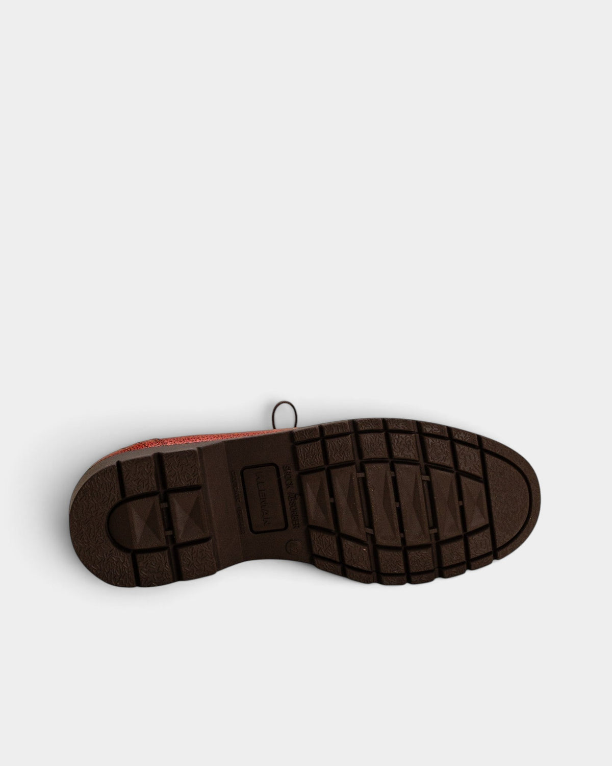 Lockwood Avenue Kleman Padror B VGT shoes showing the brown natural-rubber lug sole with shock absorber branding
