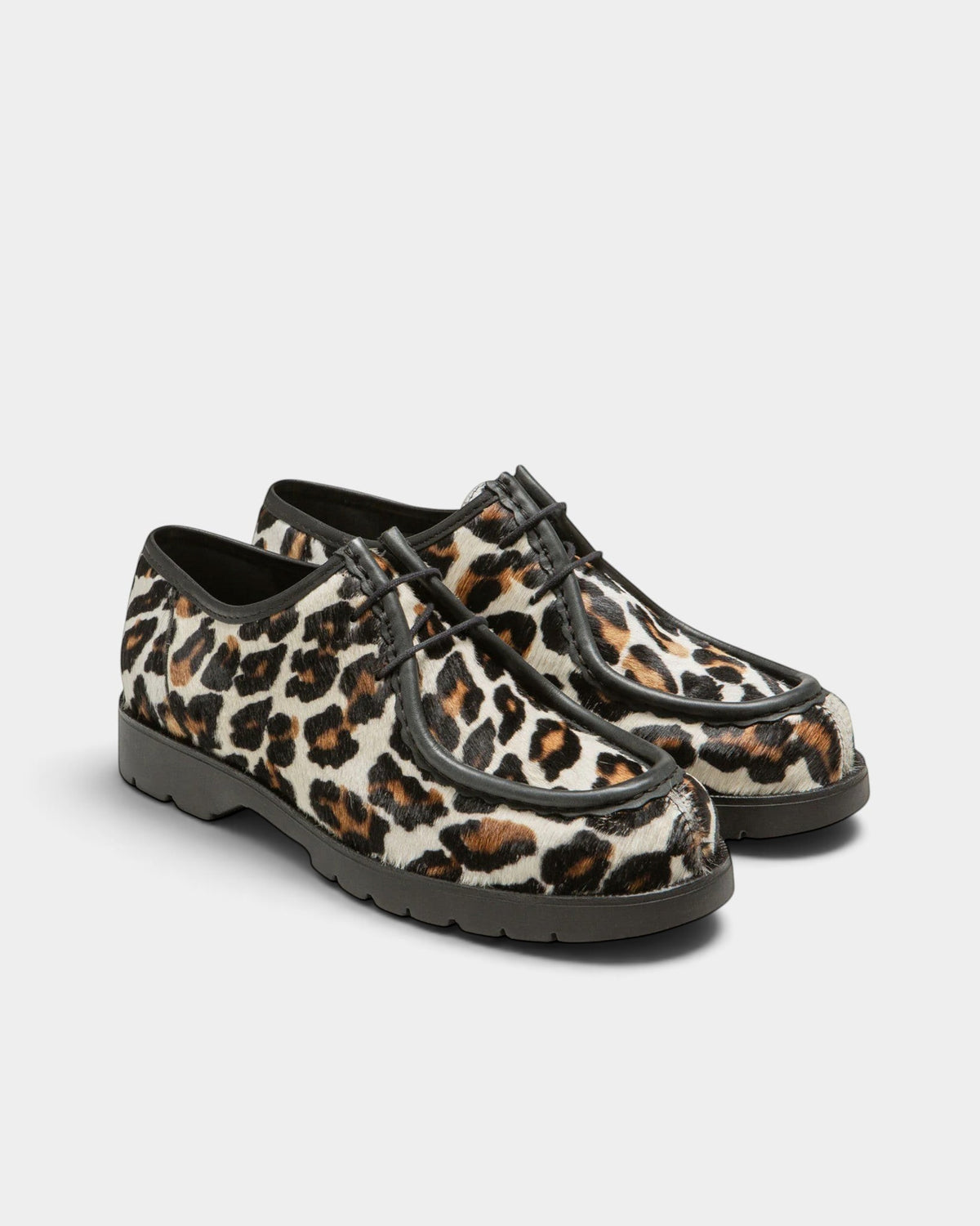 Lockwood Avenue Kleman Padror derby shoes in panther print cowhide leather with apron toe and rubber lug sole.