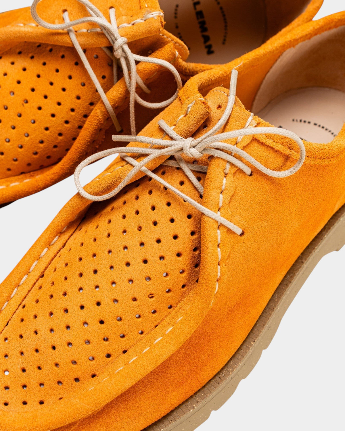 Lockwood Avenue Kleman Padror V Sum derby shoes in peach perforated suede with a rubber lug sole and light laces.