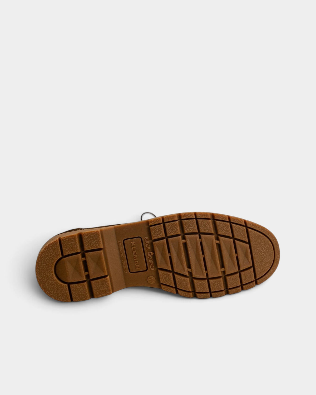 Lockwood Avenue Kleman Padror V Sum shoe showing the brown natural rubber EDITO Grip lug sole from underneath.