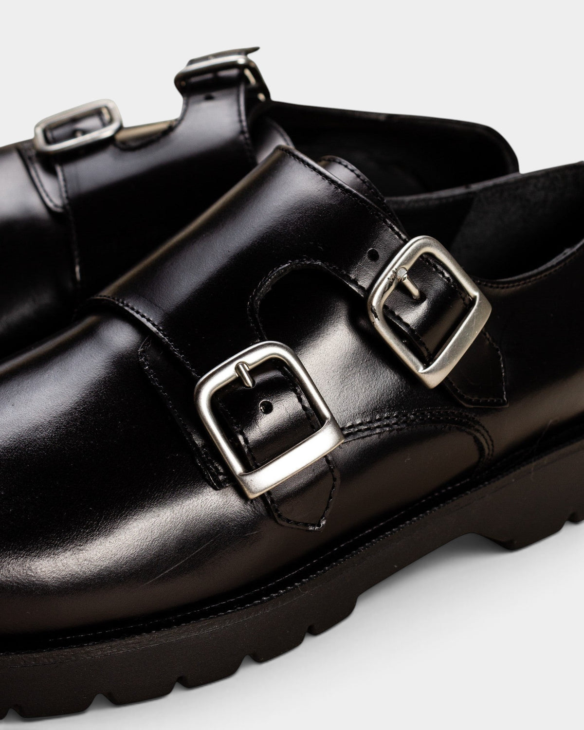 Lockwood Avenue Kleman Postier B2 black smooth leather monk shoes with twin silver buckles and a thick rubber sole.