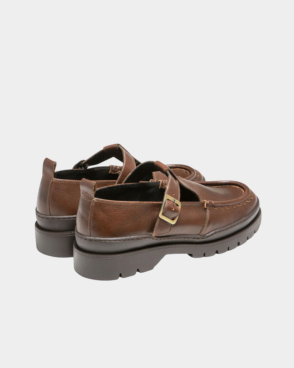 Lockwood Avenue Kleman Rade brown leather Mary Jane shoes with a buckled strap and chunky rubber lug sole.