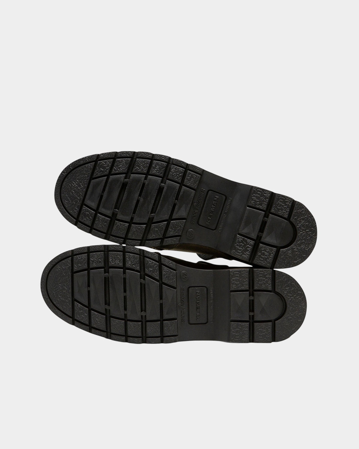 Lockwood Avenue Kleman Rade EC shoes showing the black rubber lug outsoles with shock absorber tread pattern