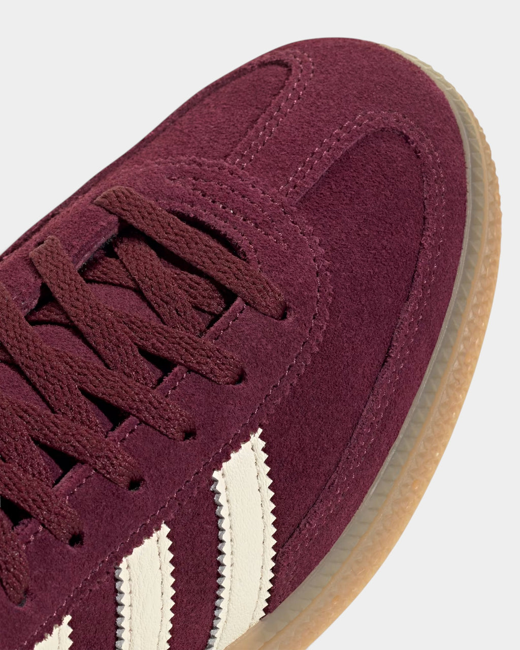 Lockwood Avenue adidas Handball Spezial maroon suede sneaker with cream white stripes and gum rubber sole close-up