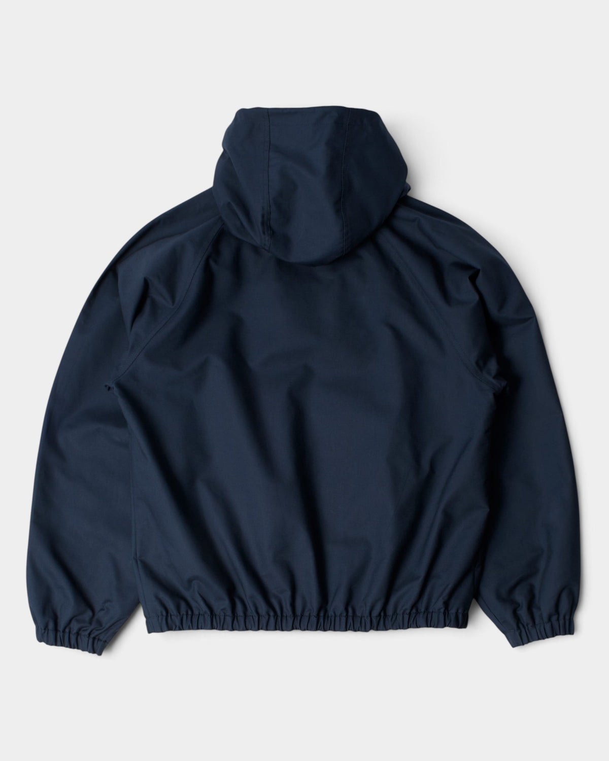 Lockwood Avenue by Parra navy blue water-repellent cotton shell jacket with a hood, back view