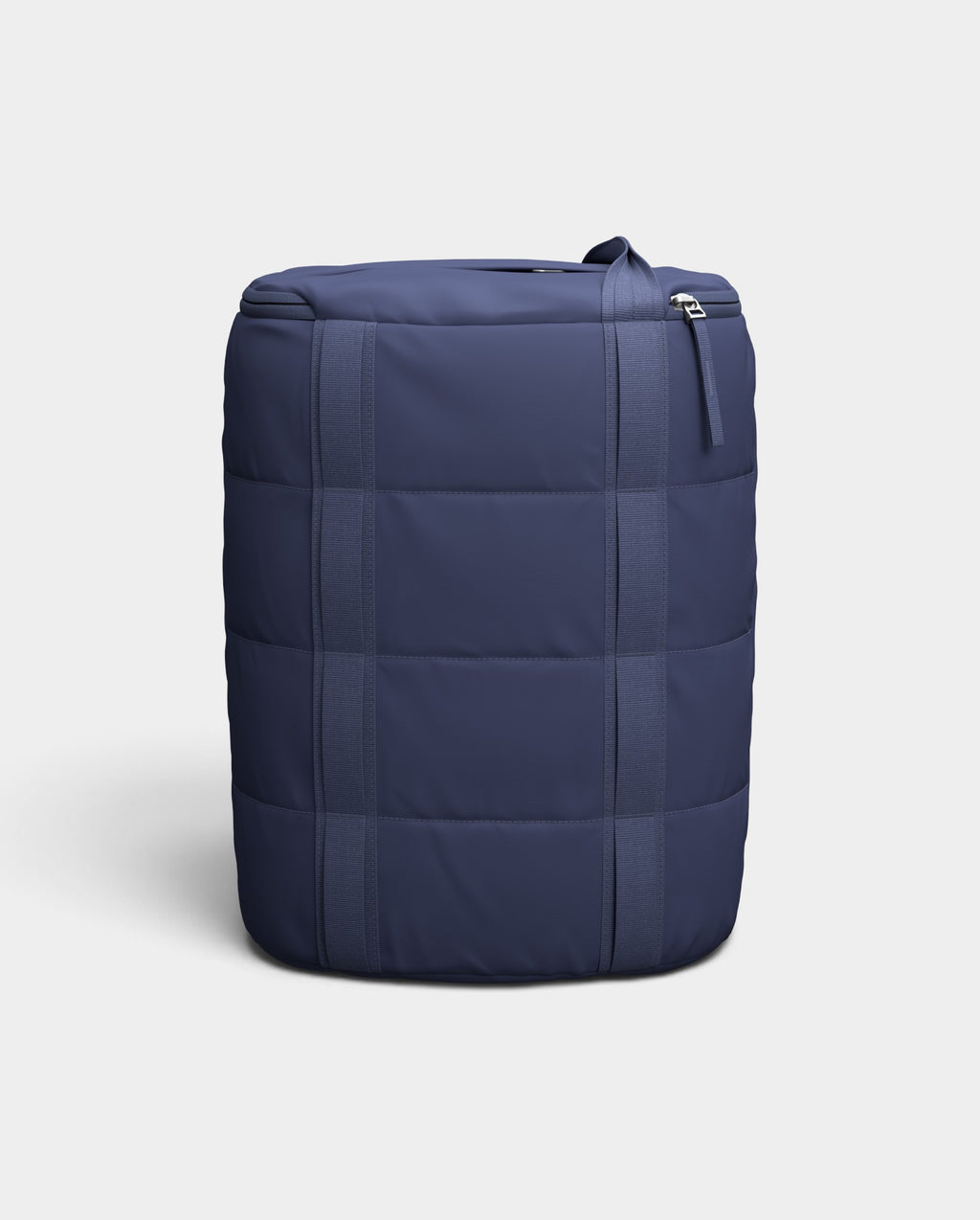 Lockwood Avenue DB Journey 25L barrel-style duffel backpack in navy blue with weather-resistant quilted construction.