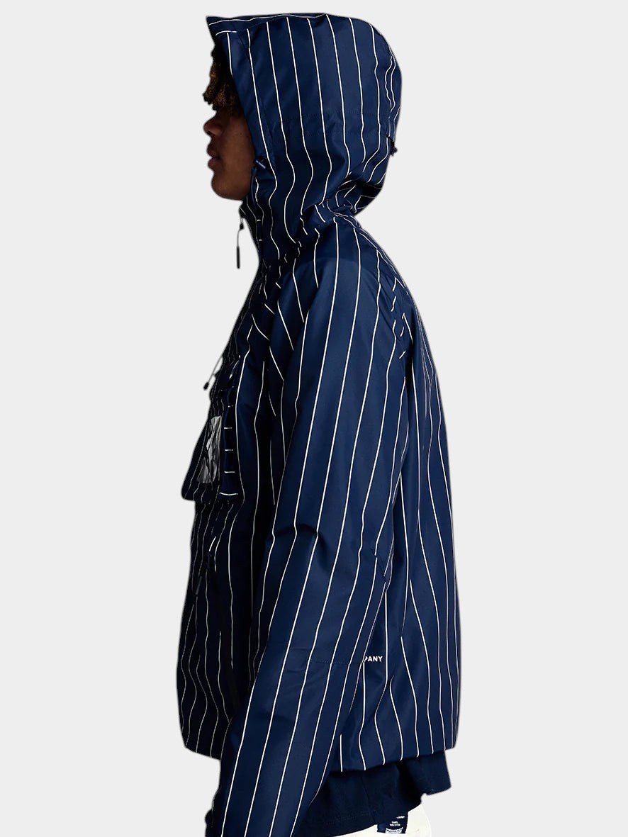 Lockwood Avenue Pop Trading Company navy pinstripe waterproof ripstop Oracle jacket with hood, side profile view