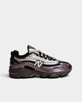 Lockwood Avenue New Balance 1000 sneakers in dark ice wine and metallic silver with mesh and suede detailing.