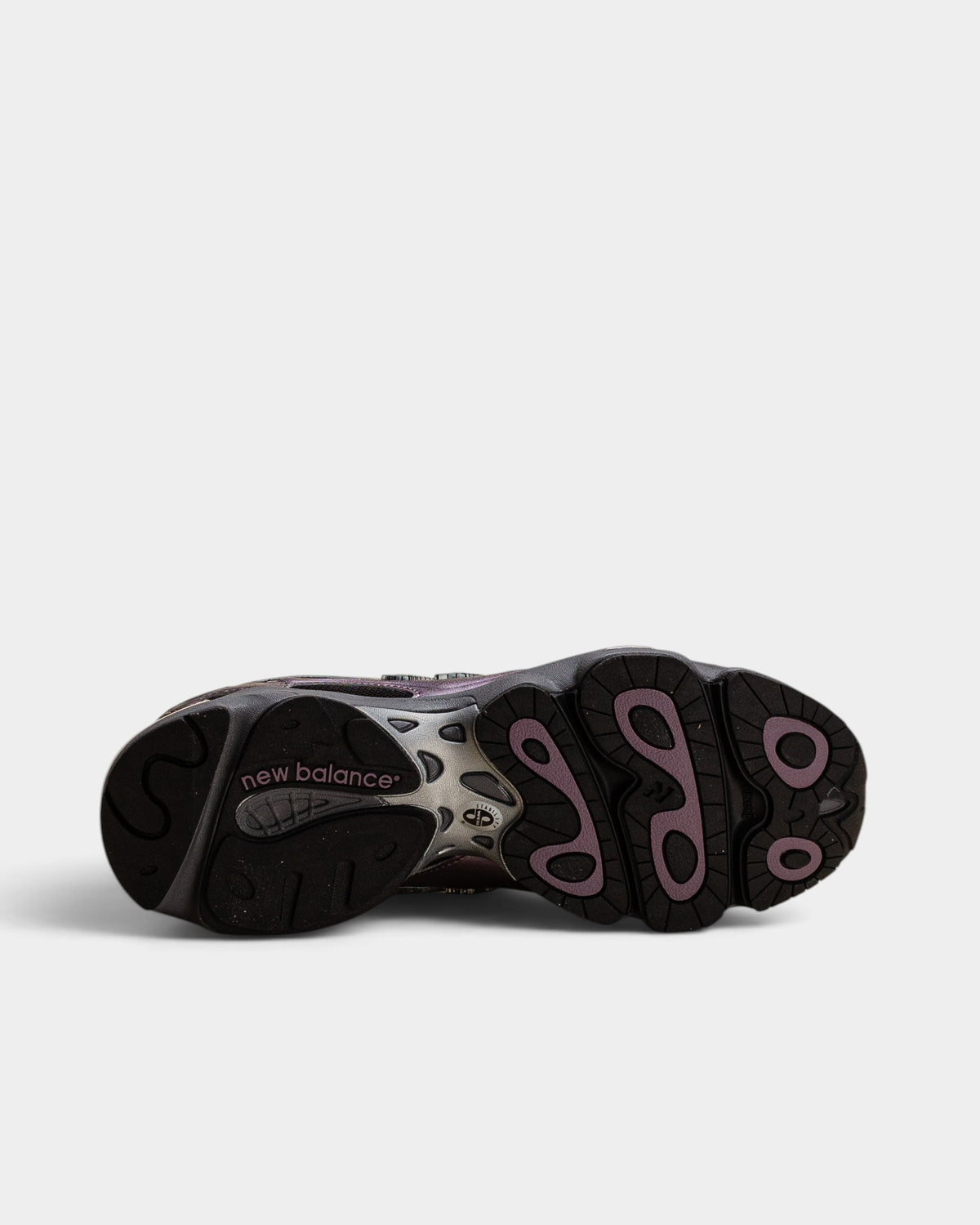 Lockwood Avenue New Balance 1000 Dark Ice Wine sneaker showing the segmented black and wine rubber outsole