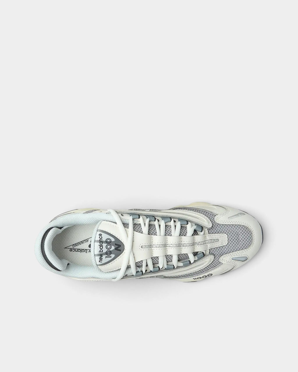 Lockwood Avenue New Balance 1000 sneakers in sea salt white leather and mesh with an aged-look midsole, top view.
