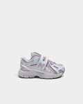 Lockwood Avenue New Balance 1906 toddler shoes in white and rose sugar with a convenient hook-and-loop strap closure.