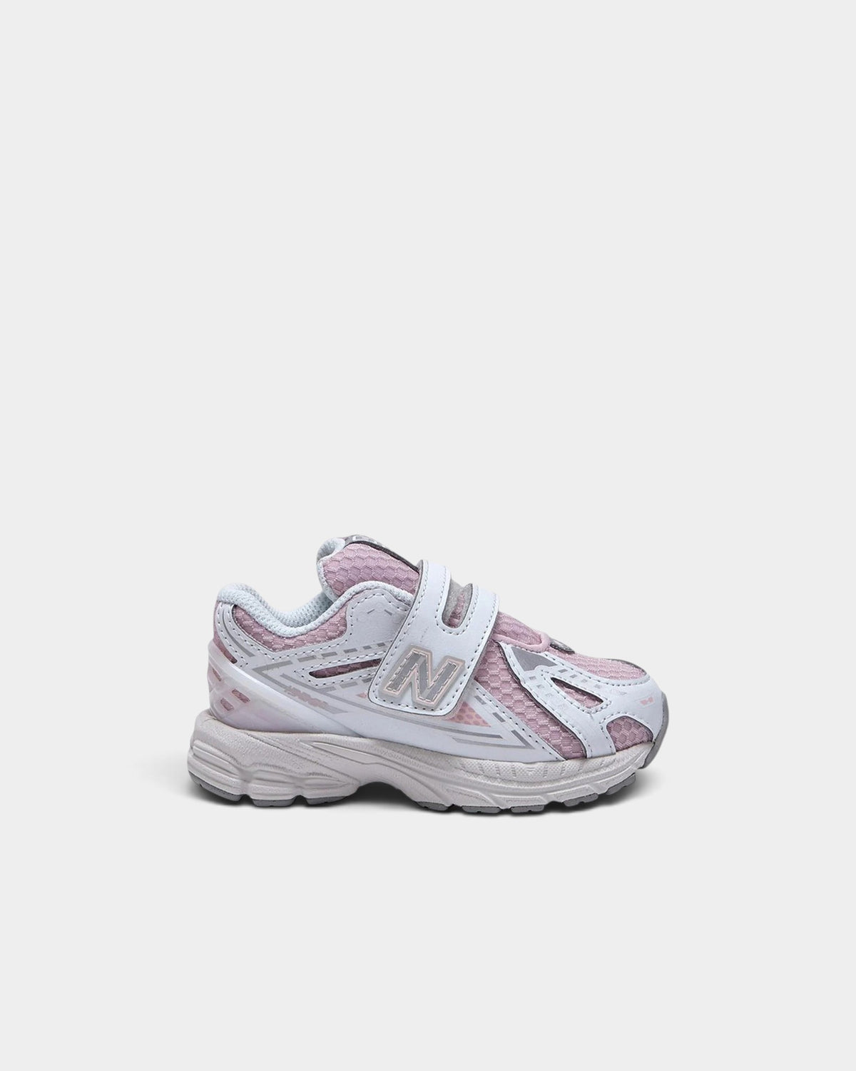 Lockwood Avenue New Balance 1906 toddler shoes in white and rose sugar with a convenient hook-and-loop strap closure.