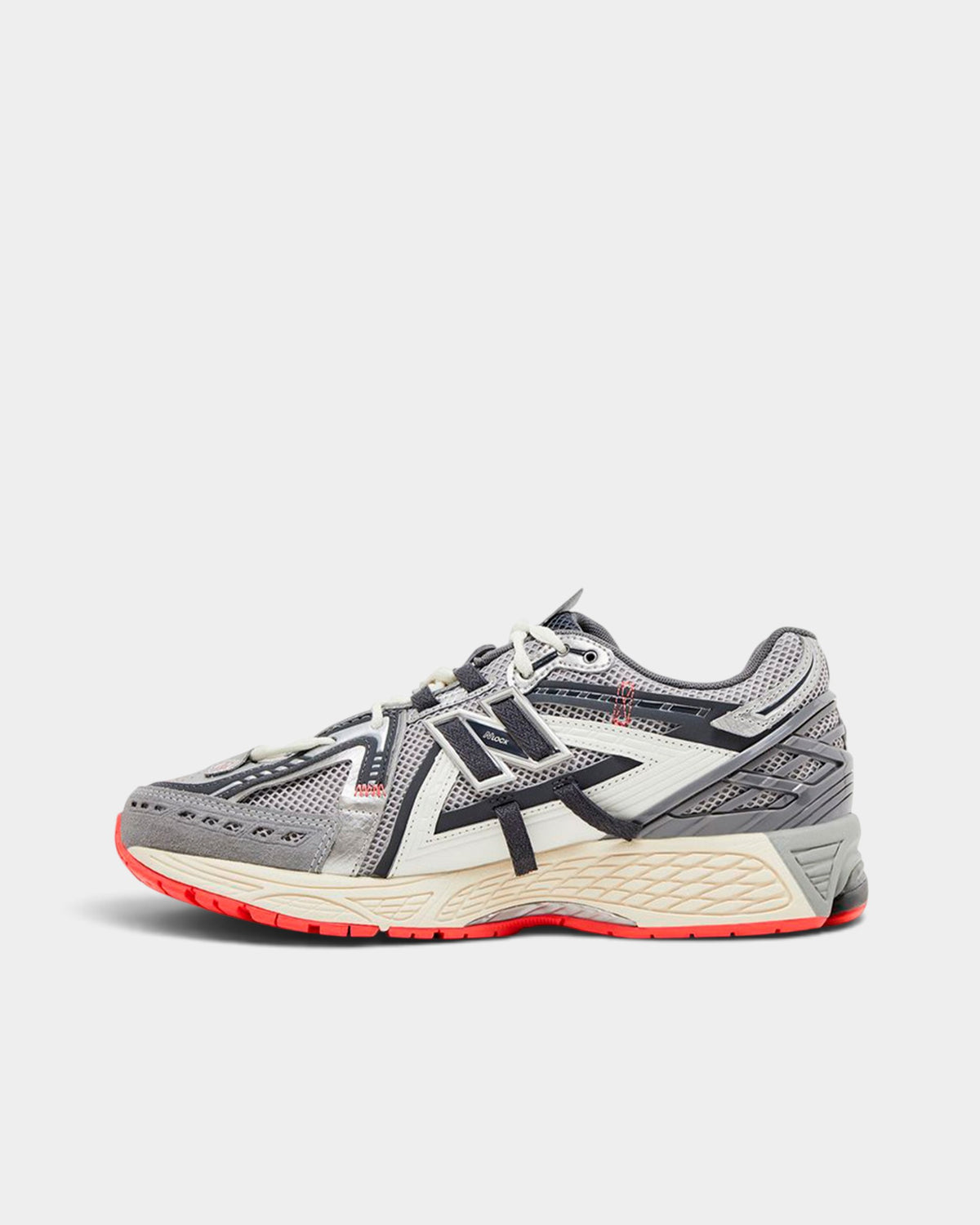 Lockwood Avenue New Balance 1906A deconstructed sneakers in grey and white with red outsole and mesh overlays.