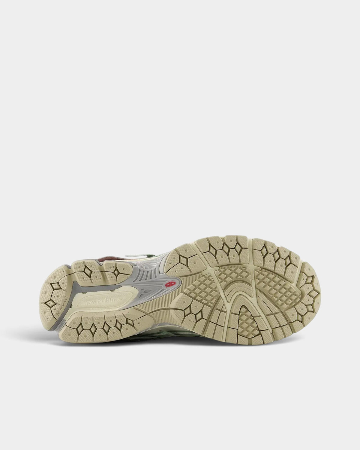 Lockwood Avenue New Balance 1906A sneaker showing the detailed off-white and grey rubber outsole tread pattern