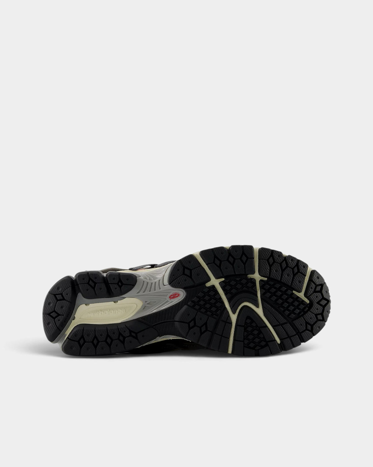 Lockwood Avenue New Balance 1906A sneaker showing the black and gray rubber outsole with ABZORB cushioning pods