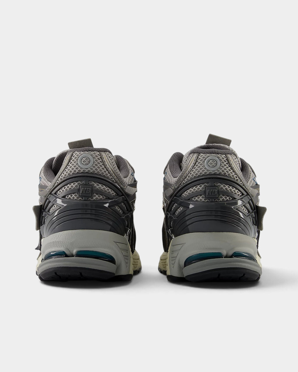 Lockwood Avenue New Balance 1906A sneakers in slate gray mesh and thunder brown suede, rear view showing heel detail.