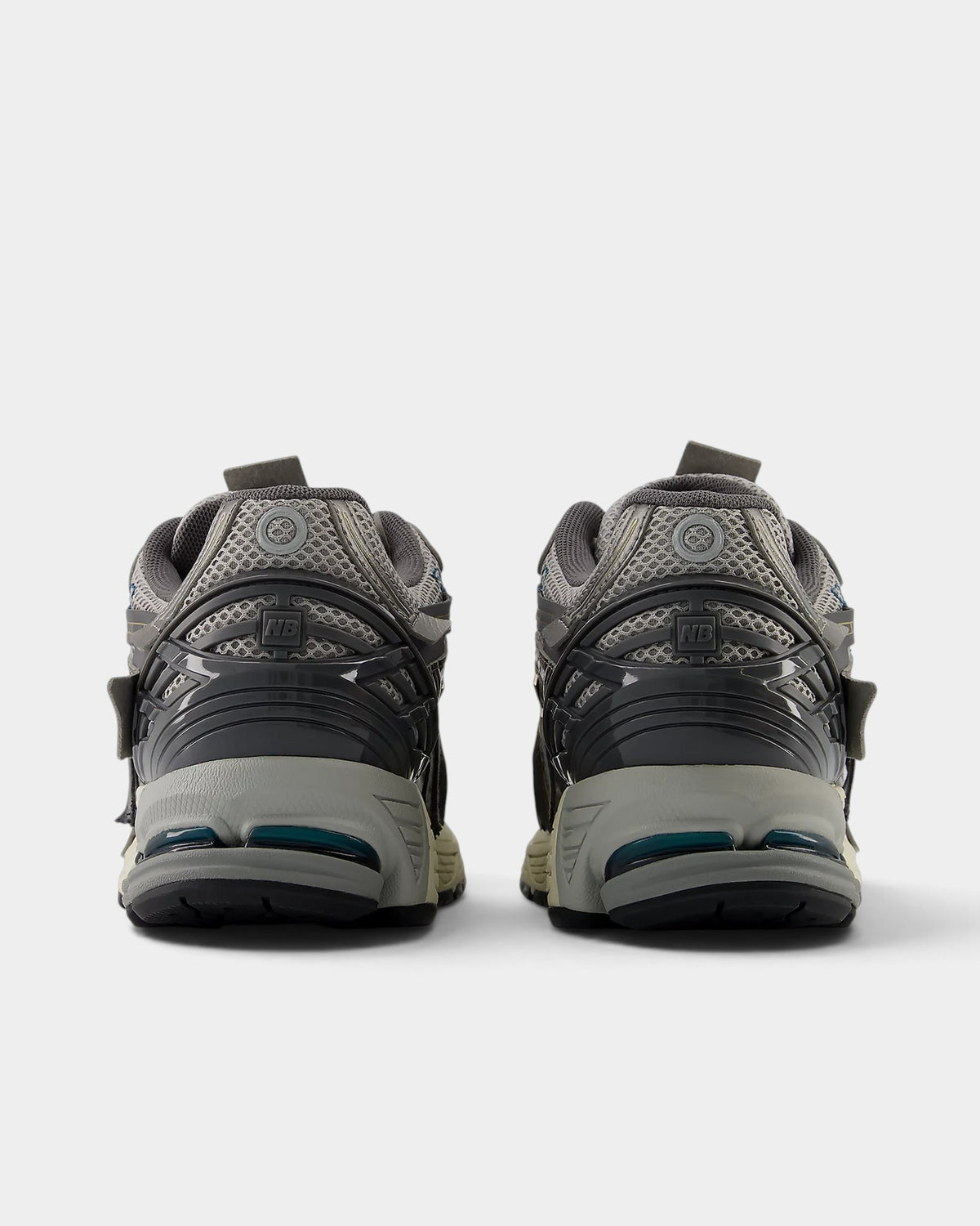 Lockwood Avenue New Balance 1906A sneakers in slate gray mesh and thunder brown suede, rear view showing heel detail.