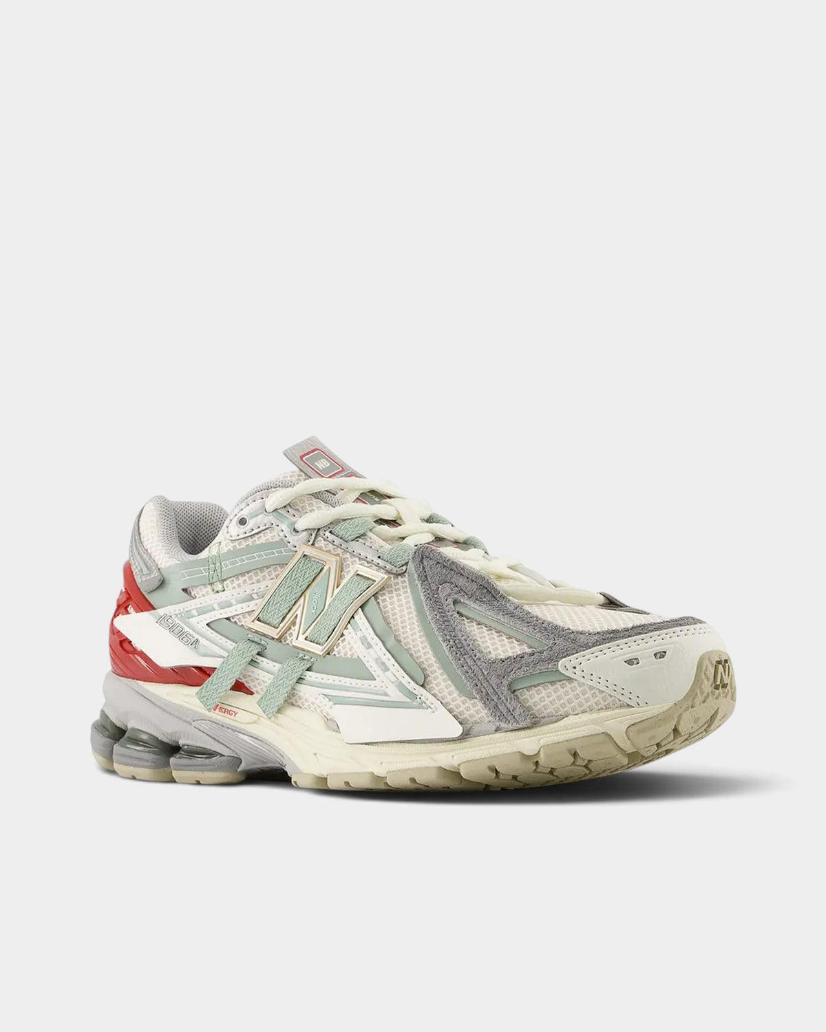 Lockwood Avenue New Balance 1906A sneakers in off-white mesh with sage green, gray overlays, and a red heel counter.