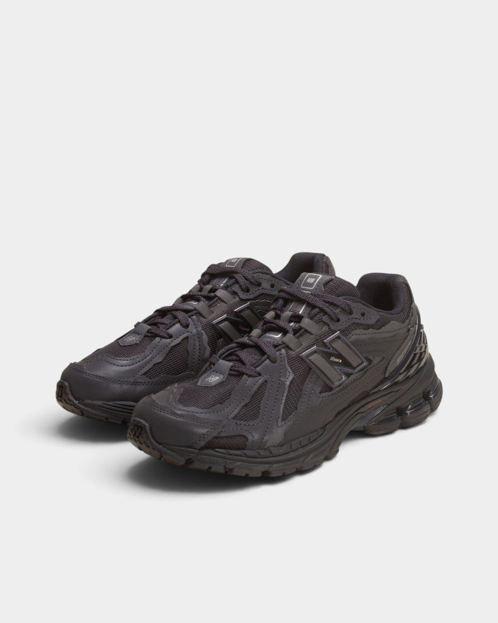 Lockwood Avenue New Balance 1906D sneakers in navy eclipse with deconstructed raw-edge synthetic leather overlays