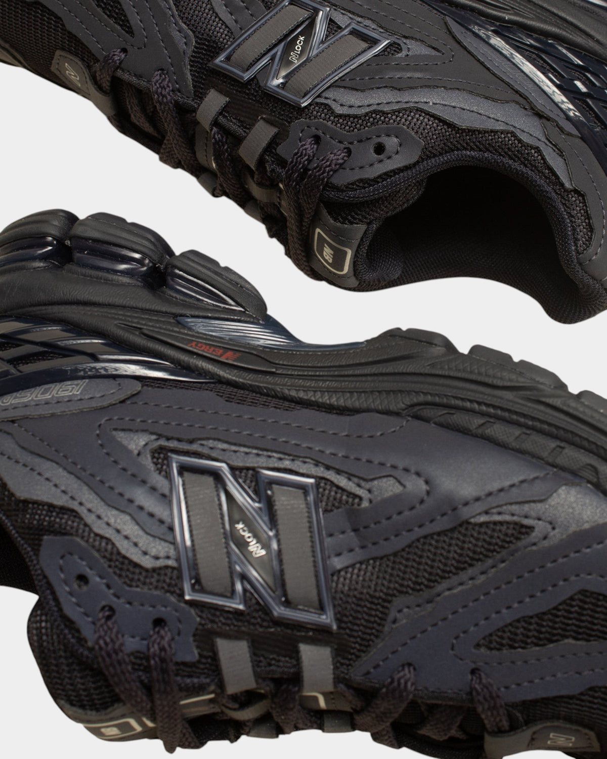 Lockwood Avenue New Balance 1906D sneakers in navy eclipse with deconstructed raw-edge leather and mesh overlays