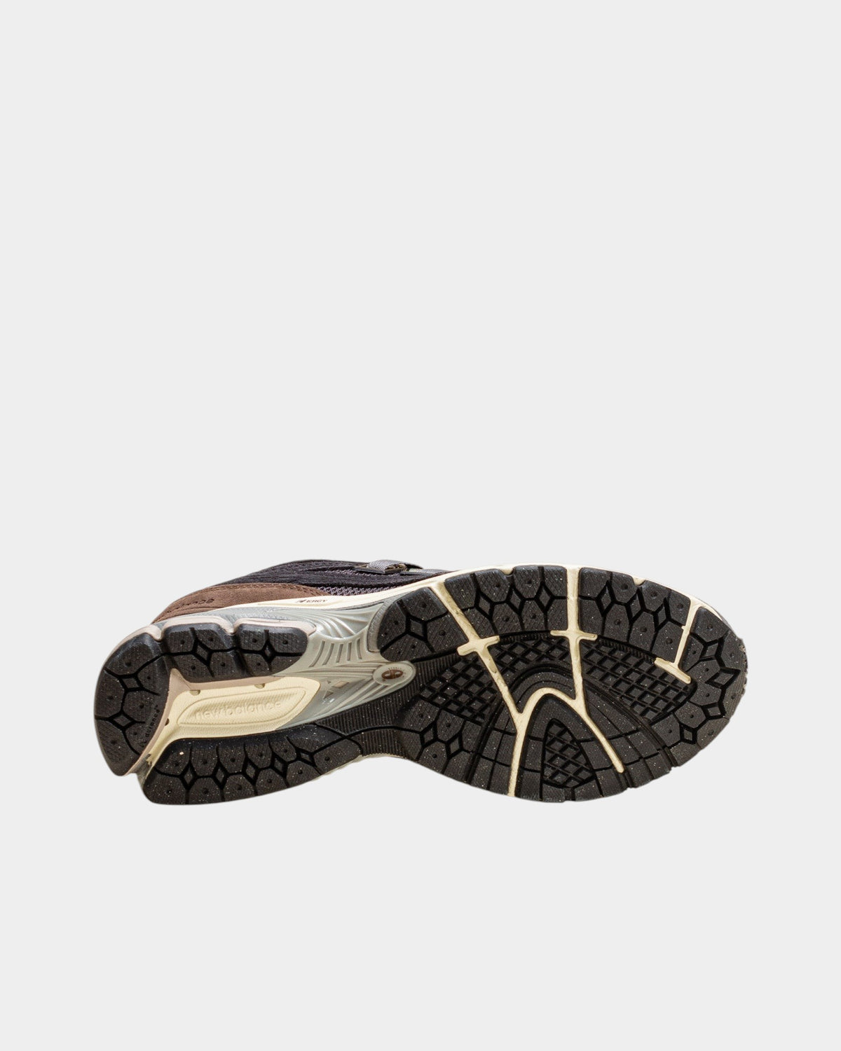 Lockwood Avenue New Balance 1906F sneaker in phantom and dark mushroom showing the textured rubber outsole